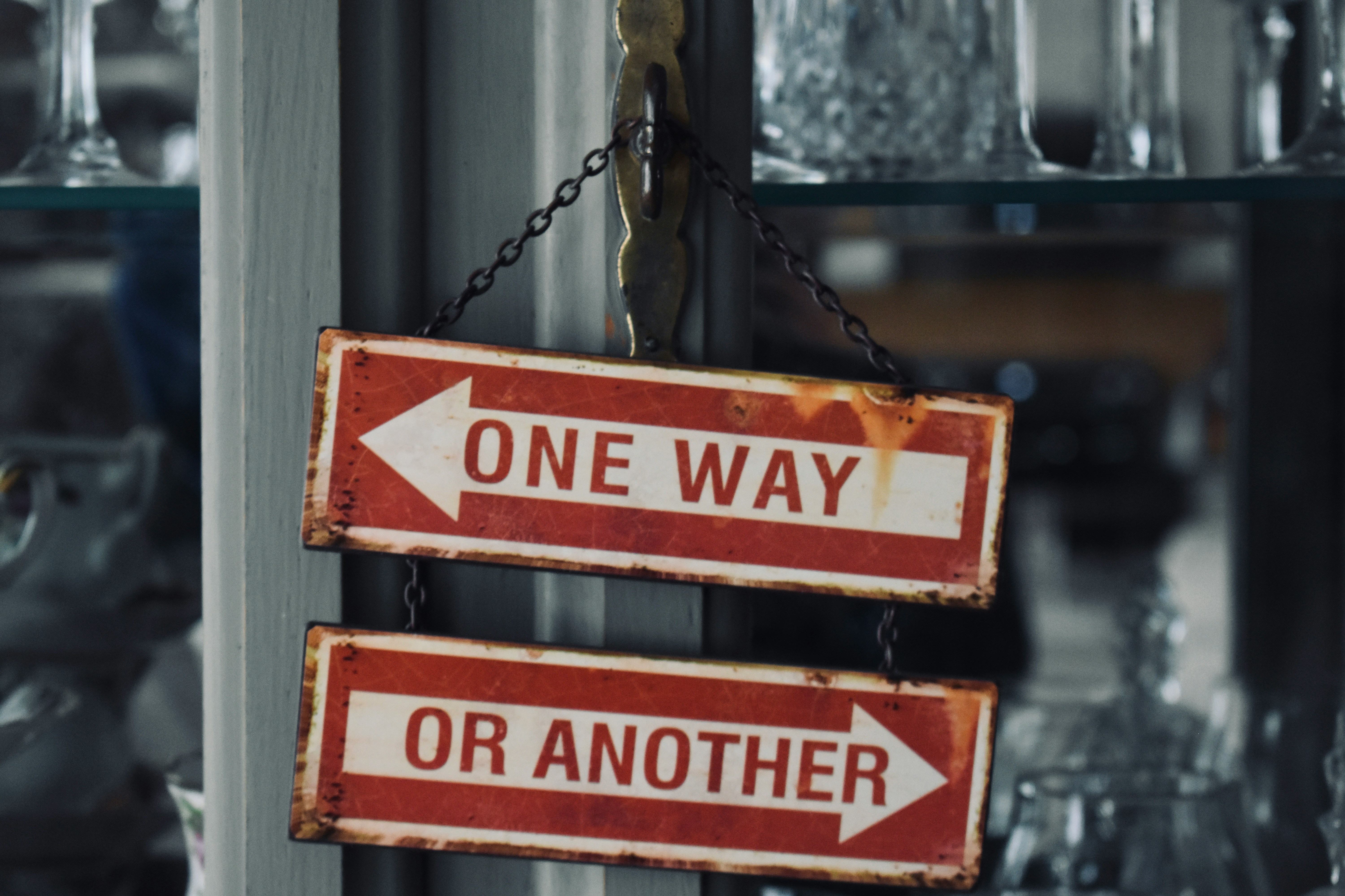 Directional signs showing 'One Way' and 'Or Another' representing different software choices